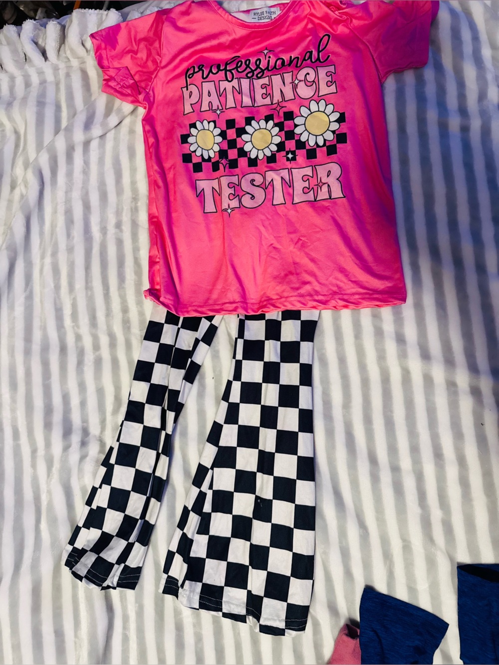 Pink Daisy Graphic Tee with Black & White Checkered Leggings